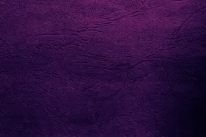 Timeless Elegance Embodied In Purple Leather Wallpaper