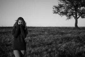 Timid Girlin Field Wallpaper