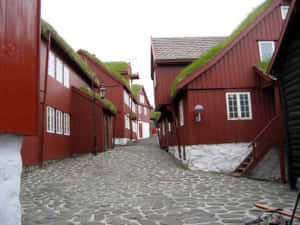 Tinganes Red Buildings Cobblestone Walkways Wallpaper