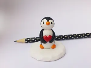 Tiny Baby Penguin Sculpture Wallpaper