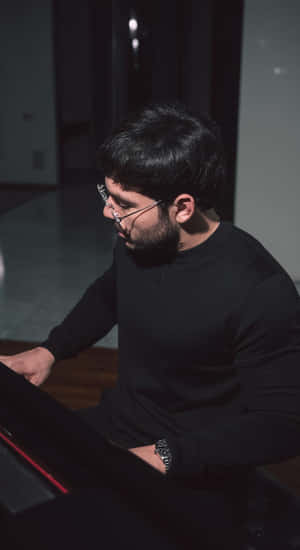 Tito Double P Playing Piano Wallpaper