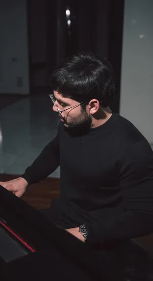 Tito Double P Playing Piano Wallpaper