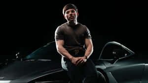 Tito Double P Stylish Car Pose Wallpaper