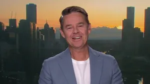 Todd Woodbridge Offering Commentary On Television Wallpaper