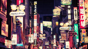 Tokyo's Colorful Assortment Of Street Signboards. Wallpaper