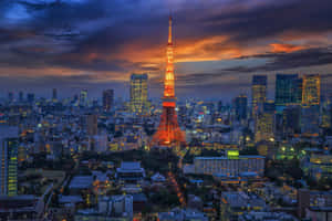 Tokyo Tower Illuminatedat Dusk Wallpaper