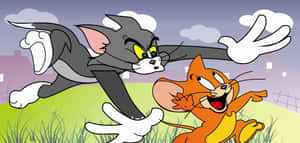 Tom And Jerry Laughing Together In A Hilarious Moment. Wallpaper