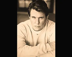 Tom Berenger: An Intense Stare From A Legendary Actor Wallpaper