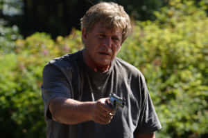 Tom Berenger Posing For A Promotional Photoshoot Wallpaper