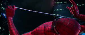 Tom Holland As The Legendary Spider Man In The Trilogy Wallpaper