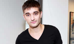 Tom Parker Striking A Pose During A Photoshoot Wallpaper