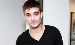 Tom Parker Striking A Pose During A Photoshoot Wallpaper