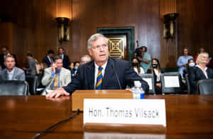 Tom Vilsack At A Courthouse. Wallpaper