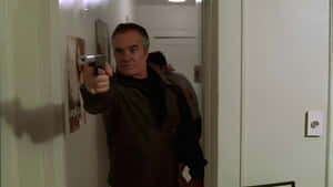 Tony Sirico Posing Confidently At A Public Event Wallpaper