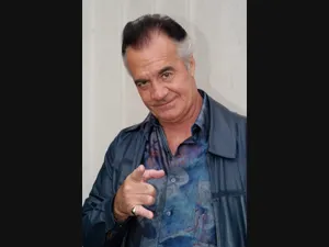 Tony Sirico Striking A Pose In A Stylish Suit Wallpaper