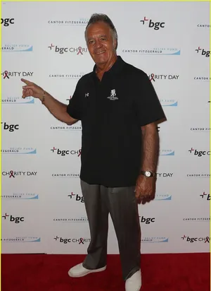 Tony Sirico Striking A Pose In A Suit Wallpaper