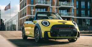 Top-down Fun: The Stylish Mini Cooper Convertible Wallpaper