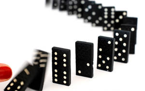 Toppling Black Dominos Wallpaper