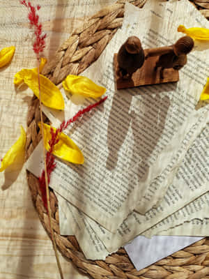 Torn Paper Pages On Basket Wallpaper