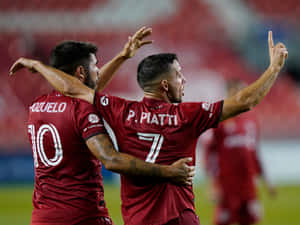 Toronto Fc Alejandro Pozuelo With Pablo Piatti Wallpaper