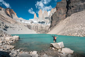 Torres Del Paine Hiker Celebration Wallpaper