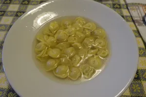 Tortellini In Brodo On A White Plate Wallpaper