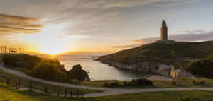 Tower Of Hercules Against The Sunset Sky Wallpaper