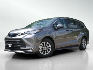 Toyota Sienna Silver Minivan Showroom Wallpaper