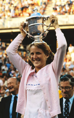 Tracy Austin Holding Trophy Wallpaper