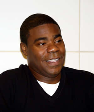 Tracy Morgan Posing For A Photoshoot Wallpaper