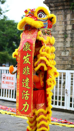 Traditional Yellow Lion Dance Wallpaper
