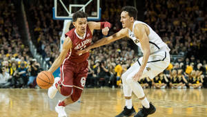 Trae Young Vs. Oklahoma Sooner Wallpaper