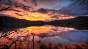 Tranquil Autumn Evening By The Lake Wallpaper