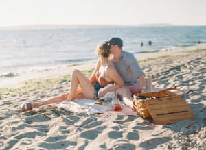 Tranquil Beach Picnic Scene Wallpaper