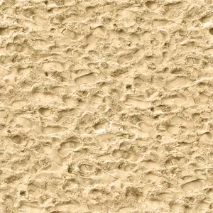 Tranquil Beach Sand With Golden Sunrays Wallpaper