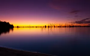 Tranquil Fall Sunset At The Lakeside Wallpaper