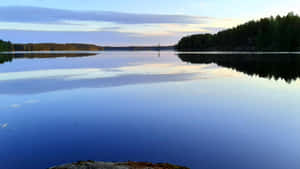 Tranquil Lake Sunset Reflection4 K Ultra Wide Wallpaper