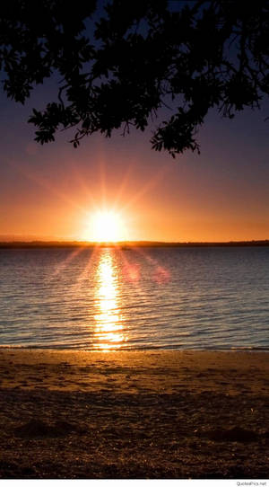 Tranquil Sunset At The Beach Wallpaper