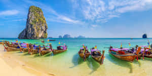 Tranquil Thai Beach Sunrise Wallpaper