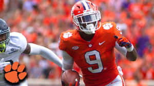 Travis Etienne Clemson Football Action Wallpaper