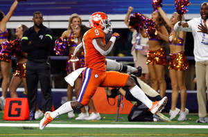 Travis Etienne Touchdown Run Wallpaper