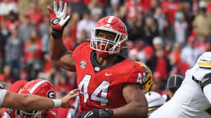 Travon Walker Georgia Bulldogs Standout Athlete Wallpaper