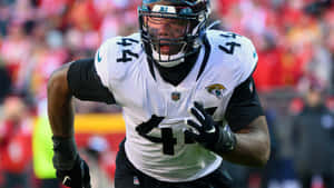 Travon Walker Wearing White Jacksonville Jaguars Wallpaper