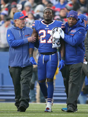 Tre Davious White Injured Being Escorted Off Field Wallpaper