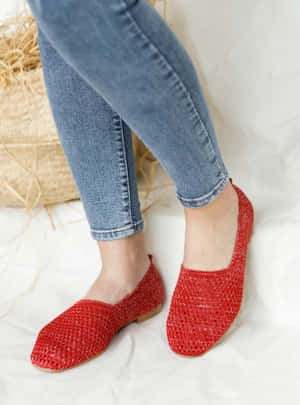 Trendy Red Shoes On Vintage Wooden Floor Wallpaper