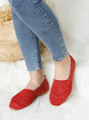 Trendy Red Shoes On Vintage Wooden Floor Wallpaper
