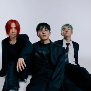 Trendy_ Trio_in_ Black_ Attire Wallpaper