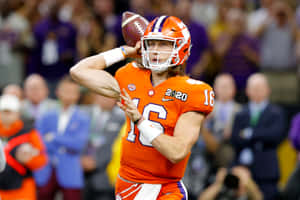 Trevor Lawrence Quarterback Action Shot Wallpaper