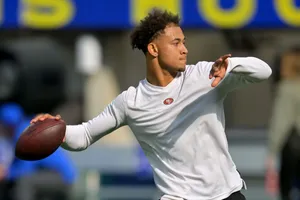 Trey Lance Quarterback Throwing Football Wallpaper