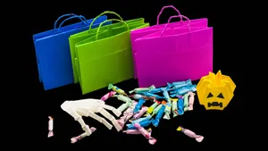 Trick-or-treat Bags Filled With Candy Wallpaper